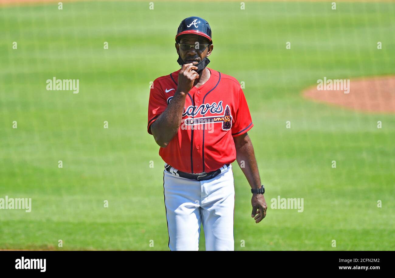 Atlanta, GA, USA. 06th Sep, 2020. Braves third base coach Ron Washington  lowers his mask as he walks back to the dugout before the fifth inning of a  MLB game against the
