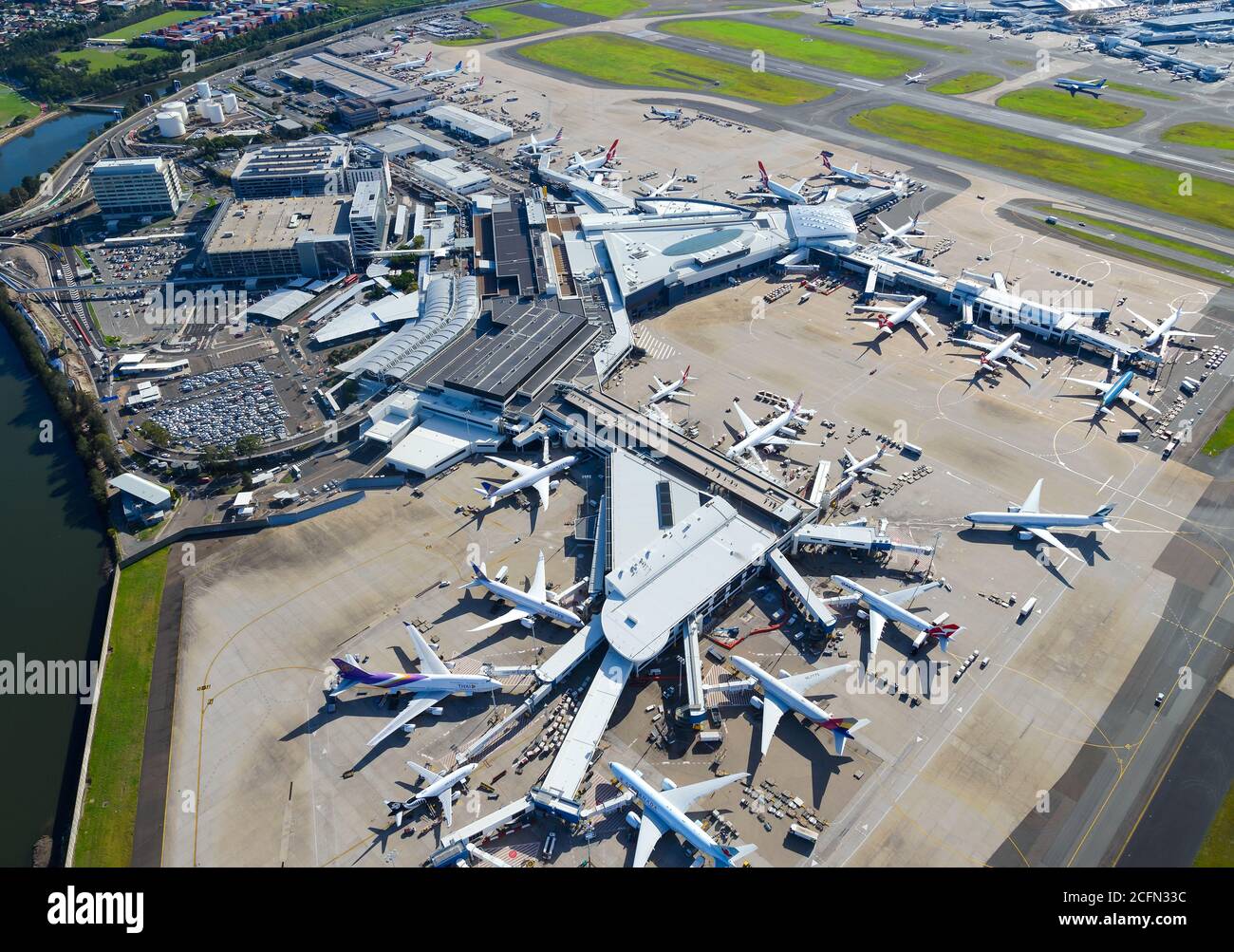 Sydney Airport aerial view with international Passengers Terminal 1 busy with international