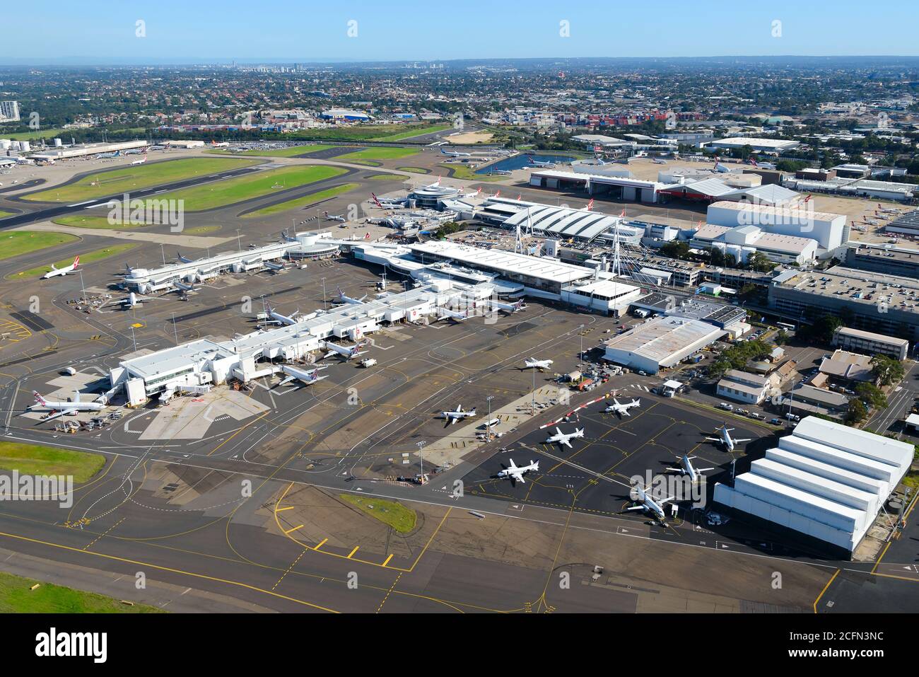 Domestic Terminal 2 and Terminal 3 at Sydney Airport. Aerial view of terminals for domestic air travel in Australia. Regional Express Airlines planes. Stock Photo