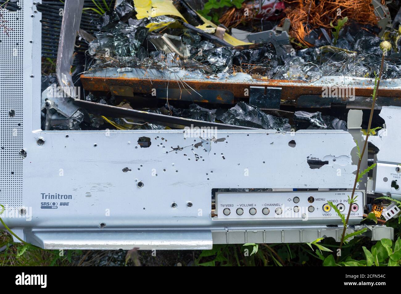 British Columbia, Canada - June 24, 2016: A smashed television on the ground Stock Photo