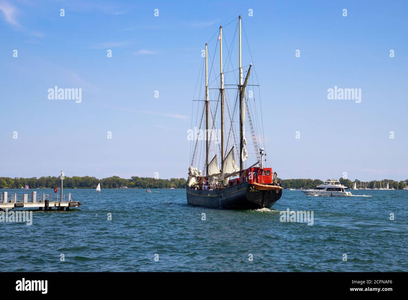 Vintage sail ship departs from the port Toronto. Untitled Stock Photo