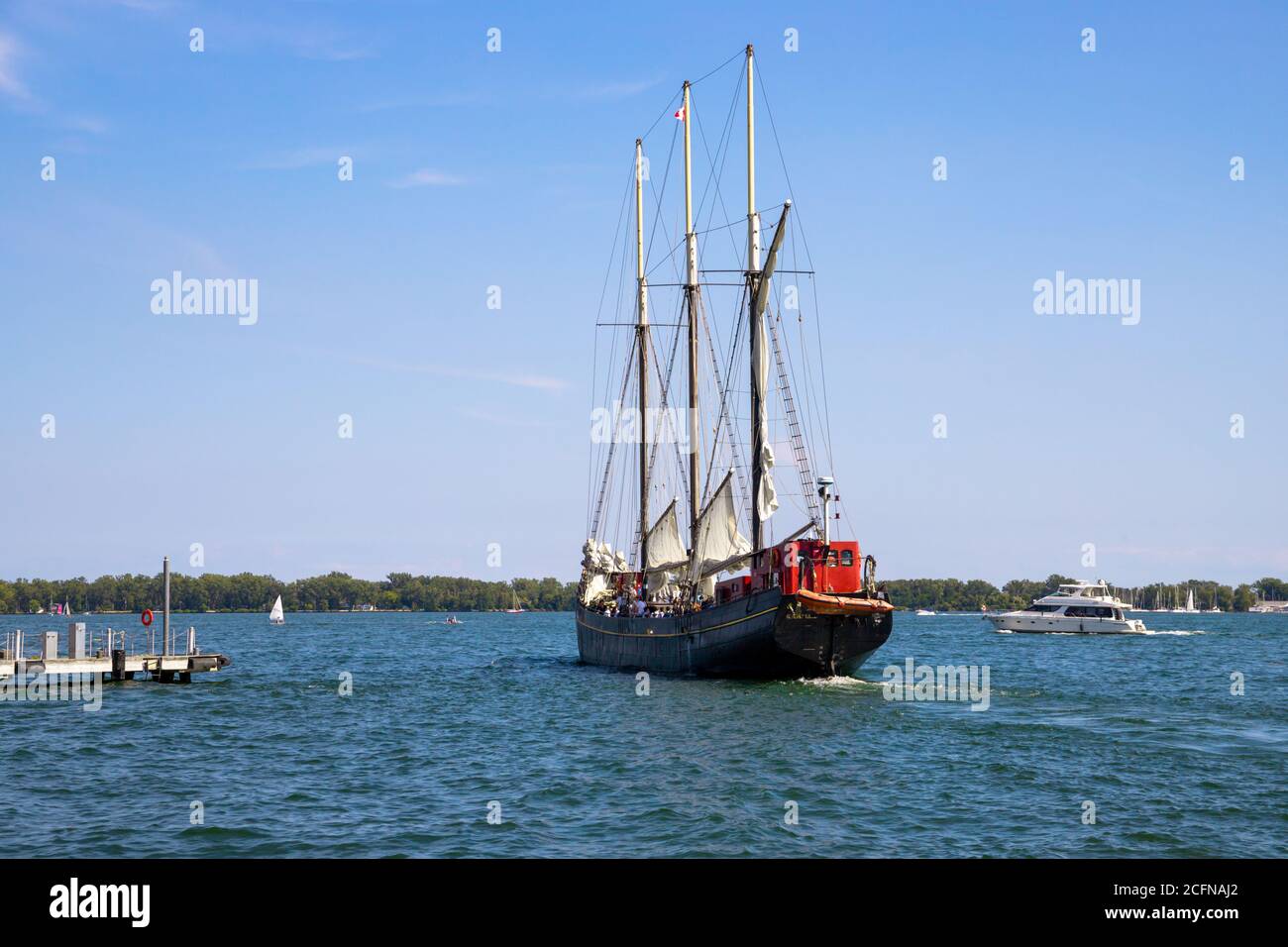 Vintage sail ship departs from the port Toronto. Untitled Stock Photo