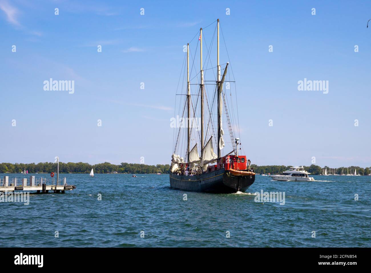 Vintage sail ship departs from the port Toronto. Untitled Stock Photo