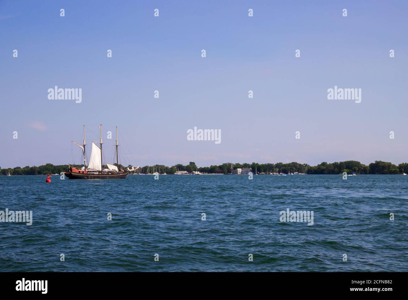 Vintage sail ship departs from the port Toronto. Untitled Stock Photo