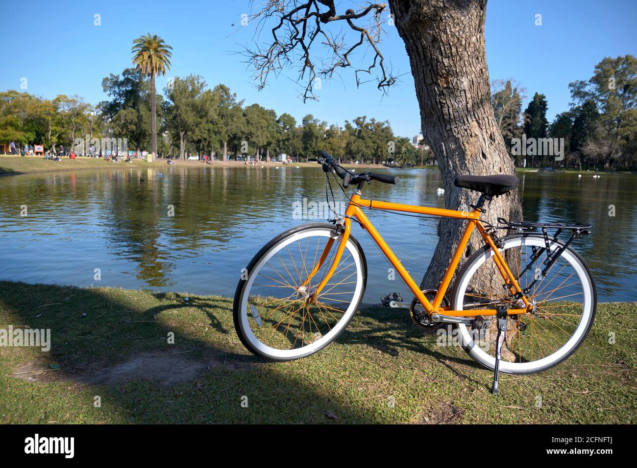 Orange bicycle next to a lake in the big public park known as Bosques de  Palermo, in Buenos Aires, Argentina Stock Photo - Alamy