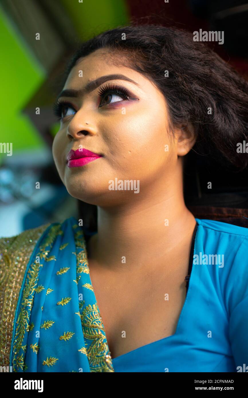 an indian teenage girl taking face makeup at a beauty salon Stock Photo -  Alamy