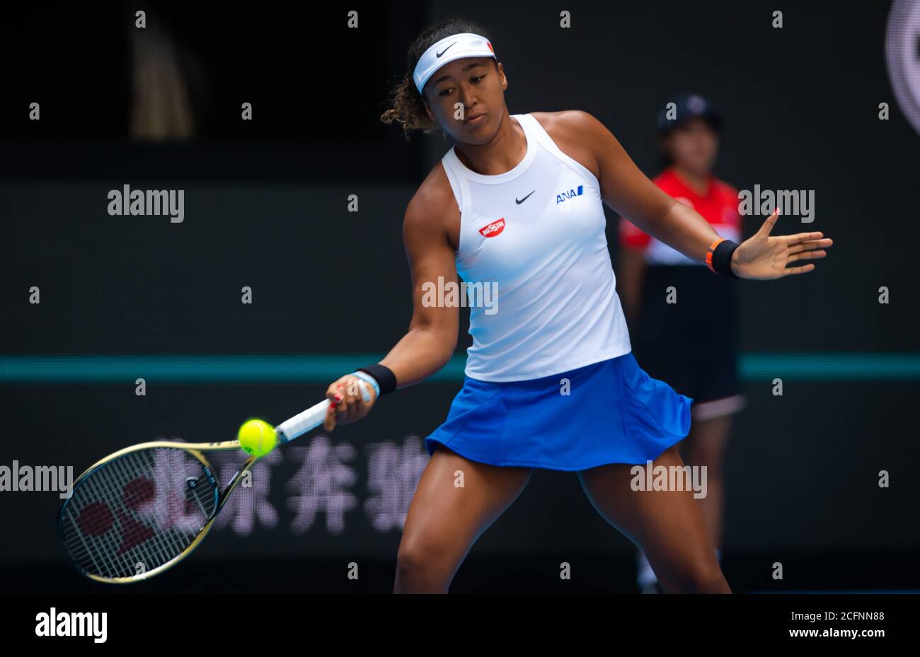 Naomi Osaka of Japan in action during her first-round match at the 2019 ...