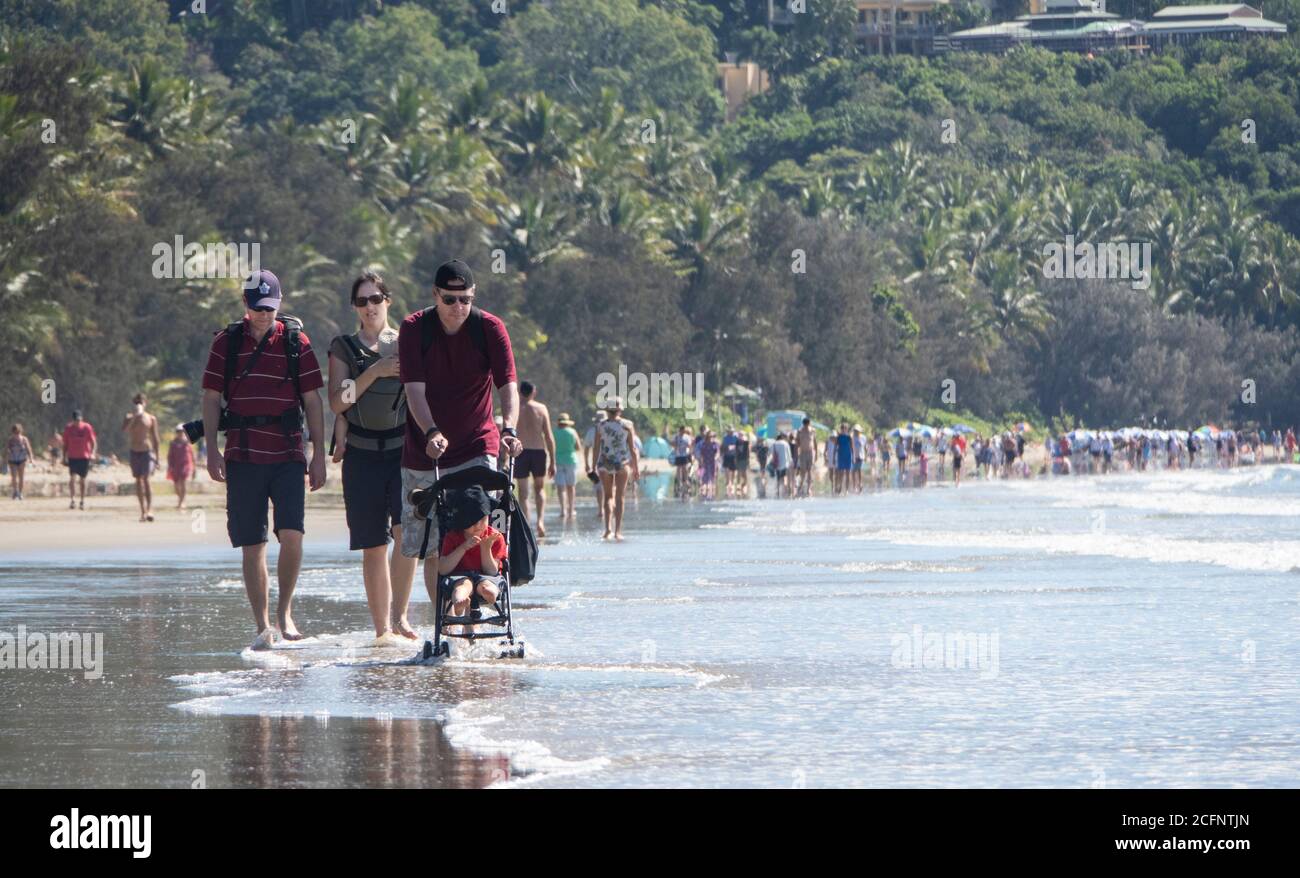 Walking along Four Mile Beach North Queensland Australia. Stock Photo