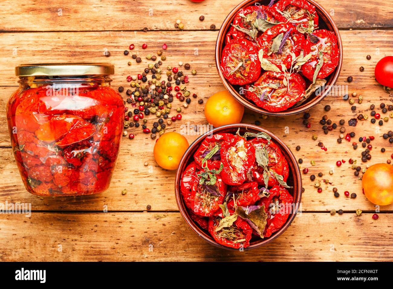 Sun dried tomatoes with herbs and spices Stock Photo Alamy