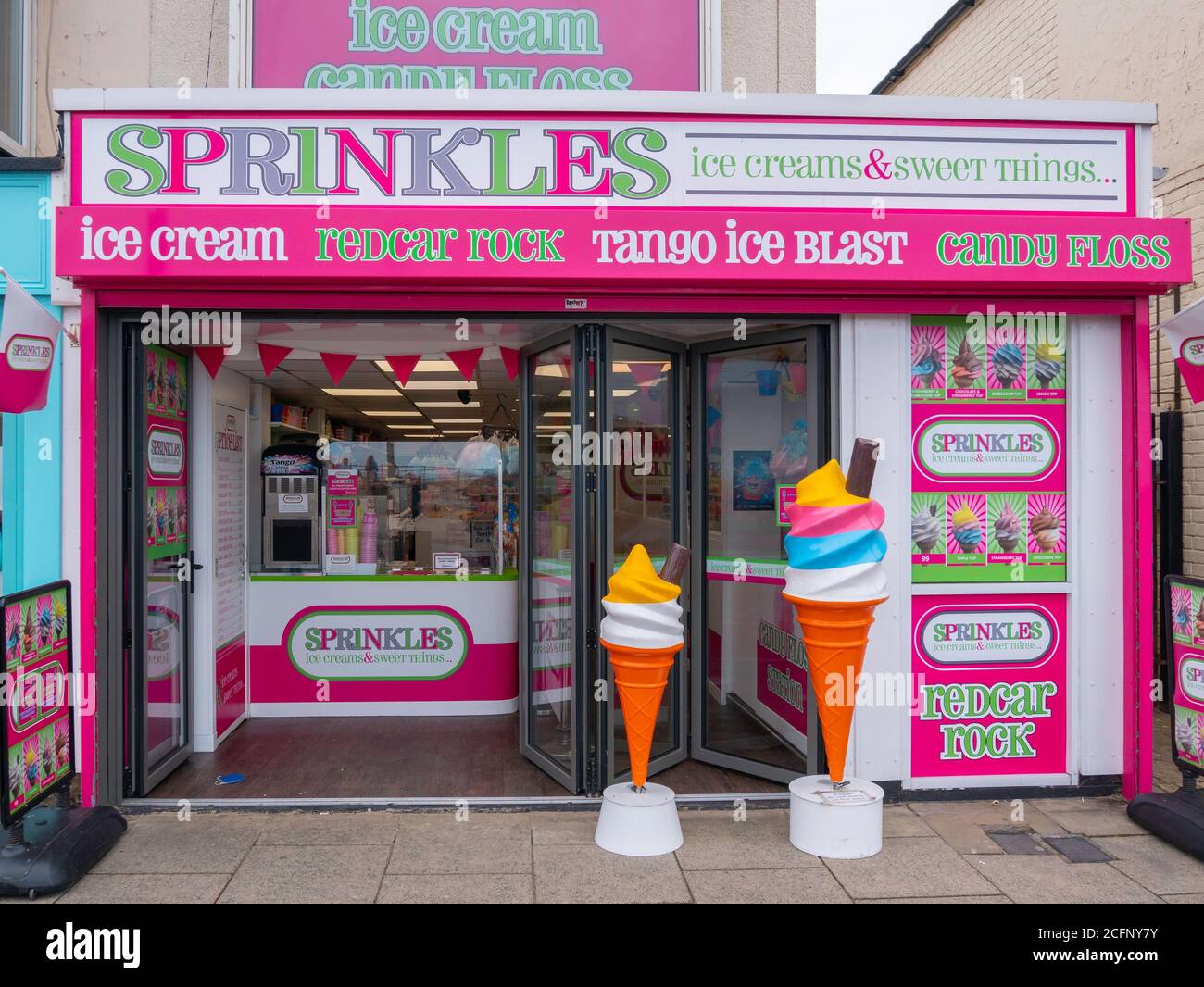 Sprinkles a traditional seaside rock and ice cream shop on the seafront at Redcar Cleveland Stock Photo