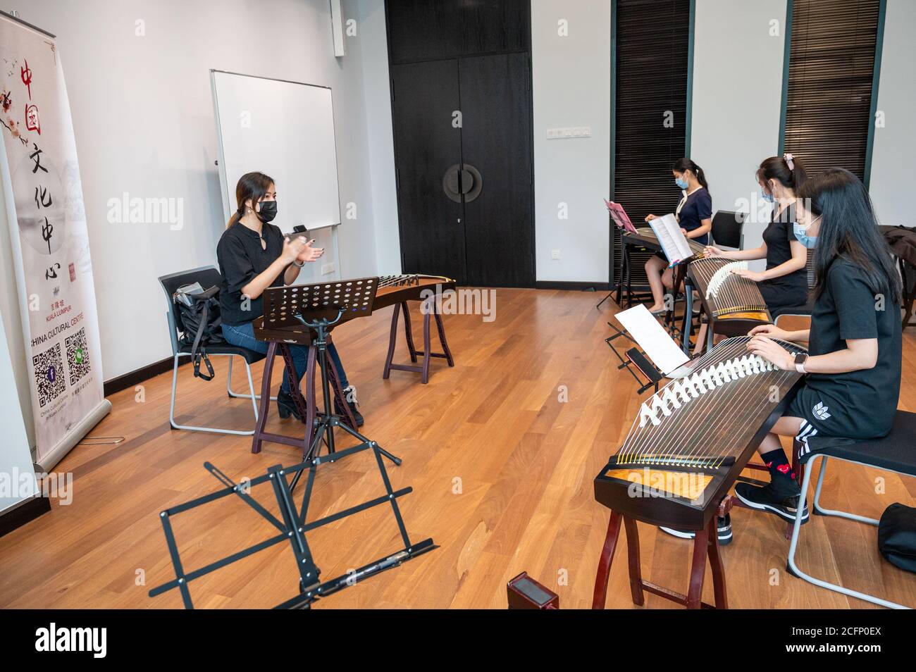 Kuala Lumpur, Malaysia. 6th Sep, 2020. Wang Xiying (L) teaches Chinese