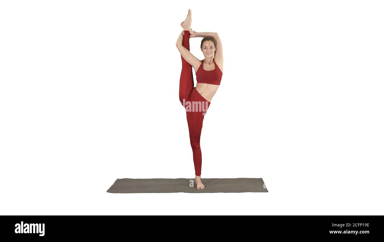 Female Yoga Model Making Standing Split Smiling on white background Stock  Photo - Alamy