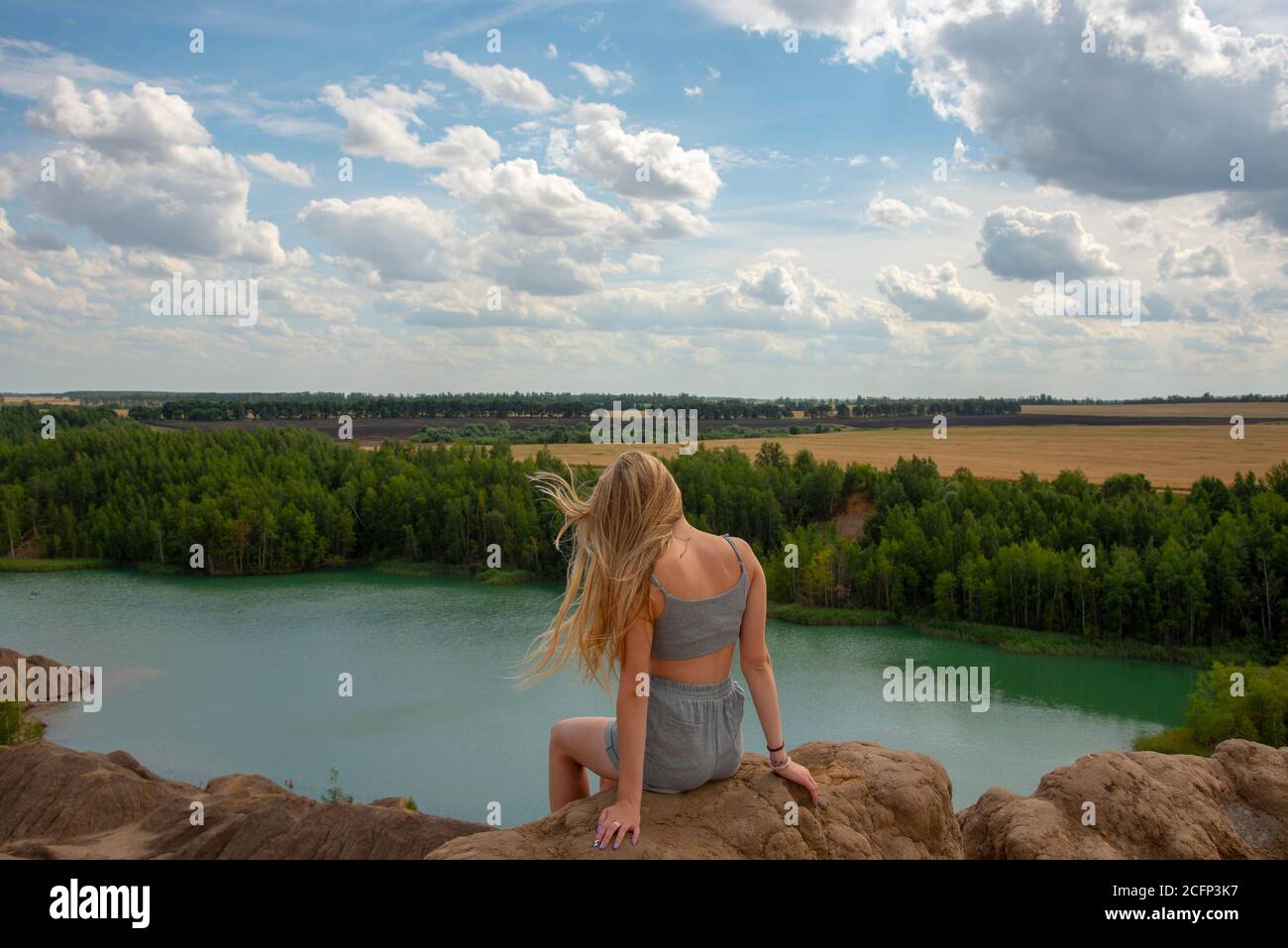 Girl Sitting On High Hill High Resolution Stock Photography and Images ...