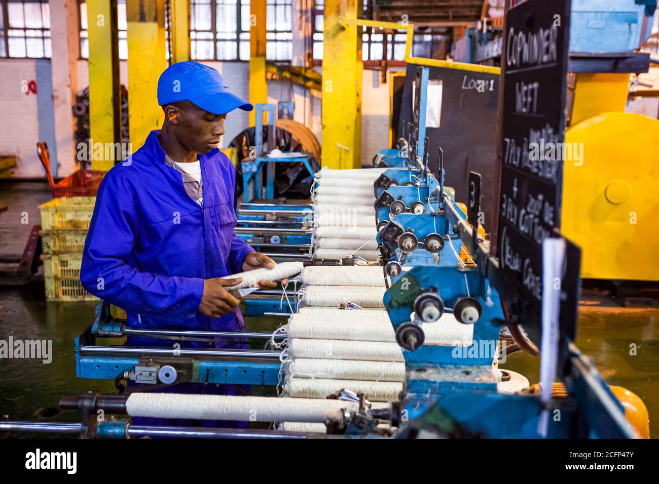 Johannesburg, South Africa - October 16, 2012: African factory worker ...