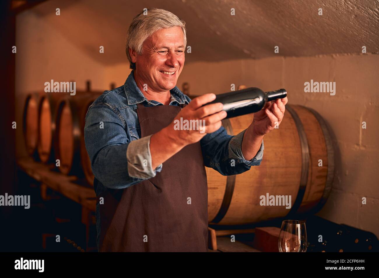 Man wine cellar bottle hi-res stock photography and images - Alamy