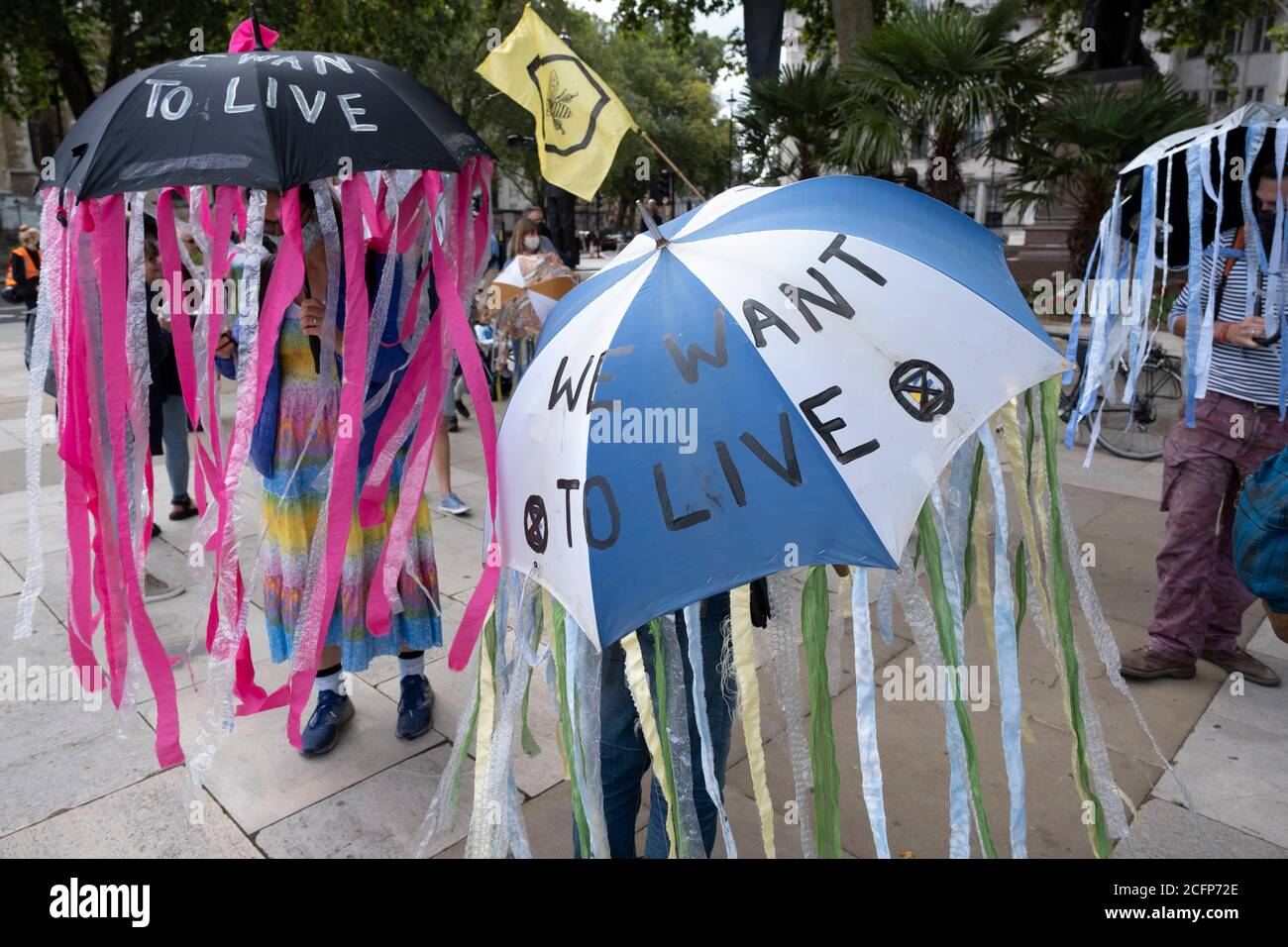 Extinction Rebellion activists dressed as jellyfish at the Marine Rebellion march on 6th September 2020 in London, United Kingdom. Ocean Rebellion, Sea Life Extinction, Animal Rebellion and Extinction Rebellion joined together to celebrate the biodiversity found in our seas, and to grieve at the destruction of the Earth’s oceans and marine life due to climate breakdown and human interference, and the loss of lives, homes and livelihoods from rising sea levels. Extinction Rebellion is a climate change group started in 2018 and has gained a huge following of people committed to peaceful protests Stock Photo