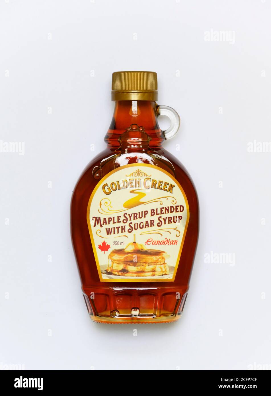 Bottle of 'Golden Creek' Canadian maple syrup blended with sugar syrup. 250ml. Stock Photo