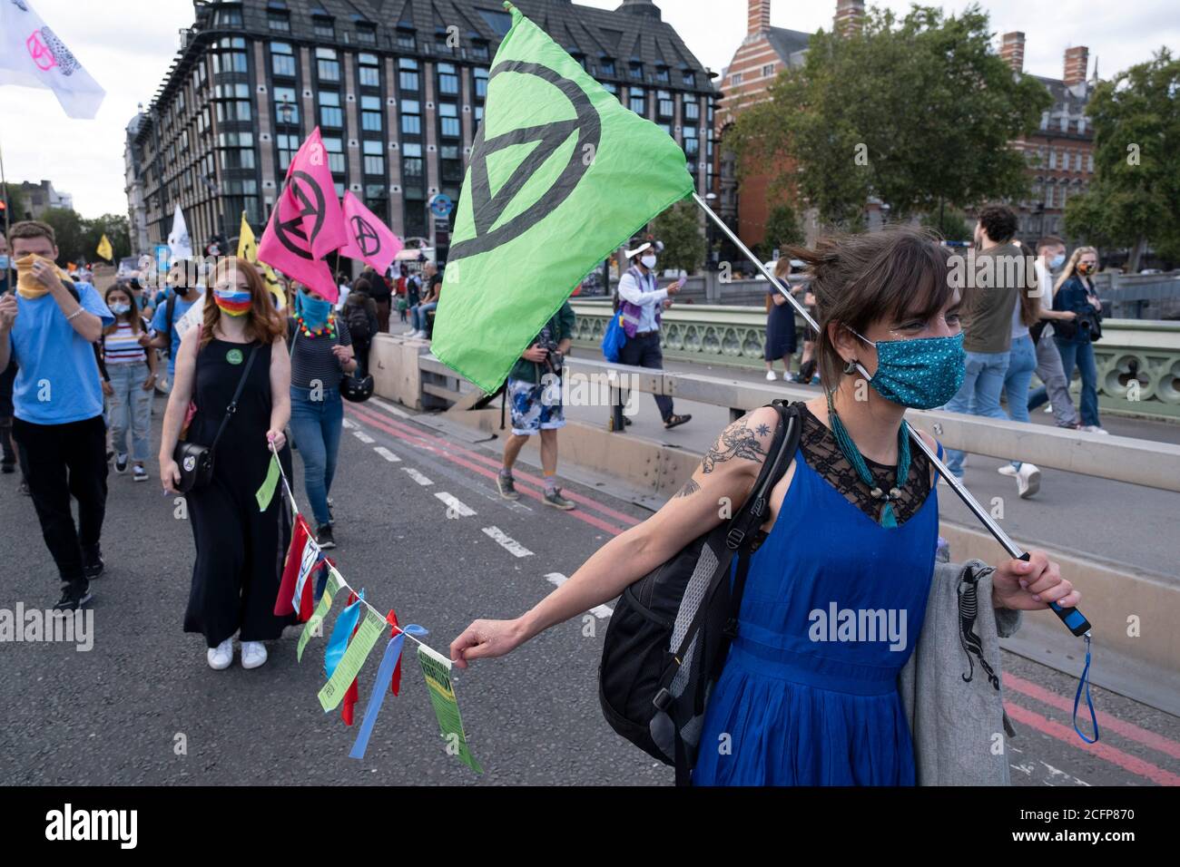 Extinction Rebellion activists at the Marine Rebellion march on 6th September 2020 in London, United Kingdom. Ocean Rebellion, Sea Life Extinction, Animal Rebellion and Extinction Rebellion joined together to celebrate the biodiversity found in our seas, and to grieve at the destruction of the Earth’s oceans and marine life due to climate breakdown and human interference, and the loss of lives, homes and livelihoods from rising sea levels. Extinction Rebellion is a climate change group started in 2018 and has gained a huge following of people committed to peaceful protests. These protests are Stock Photo