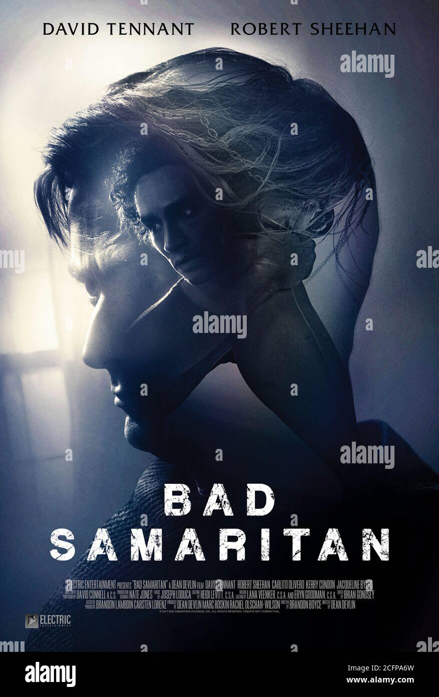 Bad Samaritan (2018) directed by Dean Devlin and starring David Tennant, Robert Sheehan, Carlito Olivero and Kerry Condon . Burgulars enter a house and discover a woman tied and gagged in a chair. Stock Photo