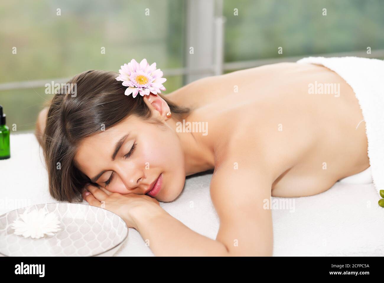 Body care. Spa body massage european women hands treatment. Woman having massage in spa Stock Photo