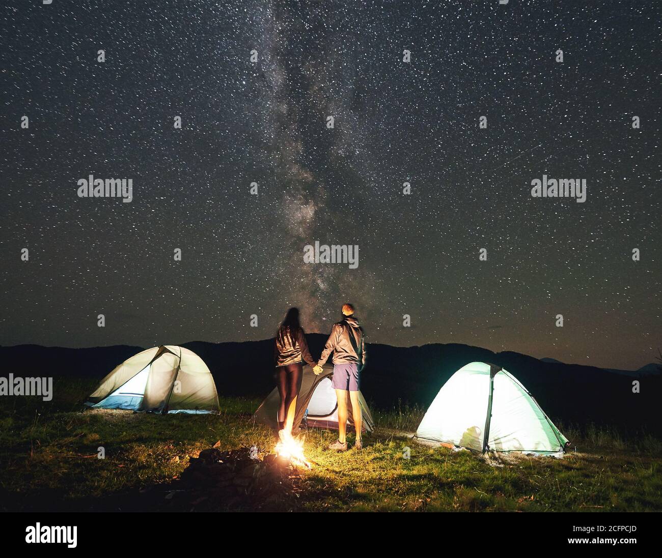 Man Standing Under Stars At Night High Resolution Stock Photography And Images Alamy