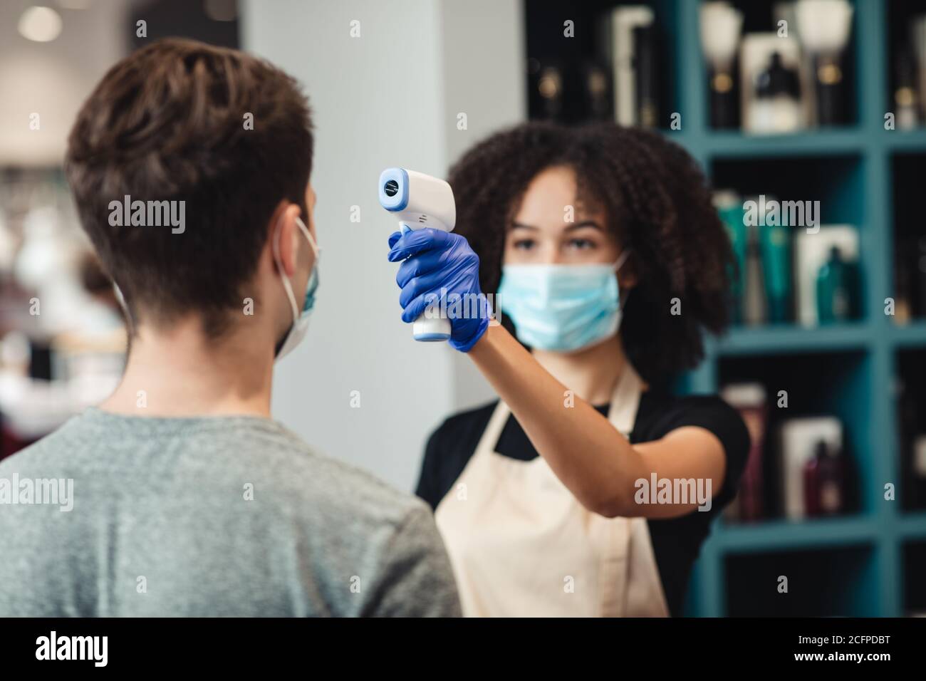 Close up woman measuring temperature hi-res stock photography and ...