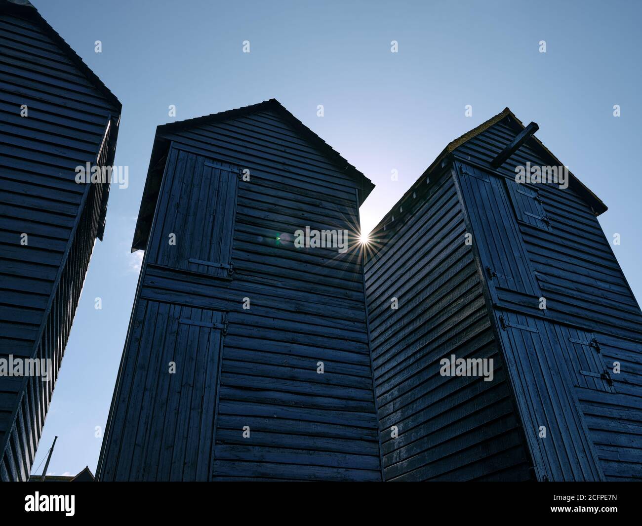Hastings Net Shops tall black wooden huts / sheds / shacks provide a