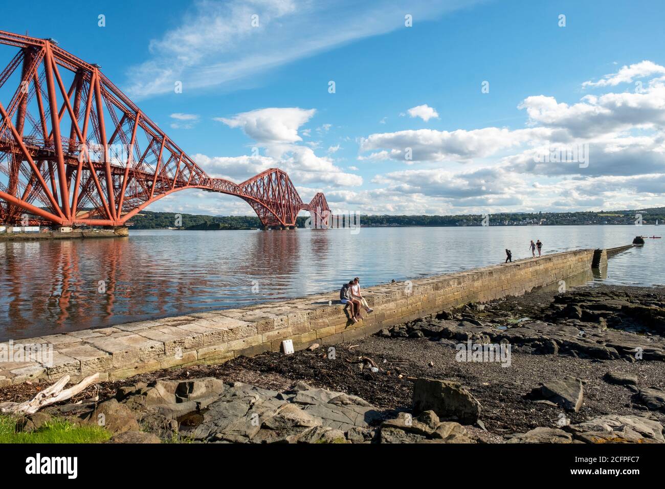 South Bay North Queensferry and the Forth Rail Bridge spanning the Firth of Forth, Fife, Scotland. Stock Photo