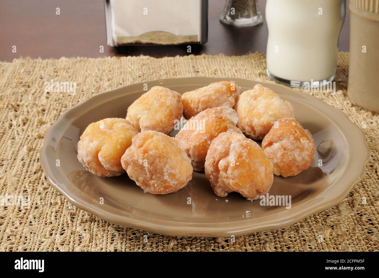 Doughnut holes with coffee and milk Stock Photo