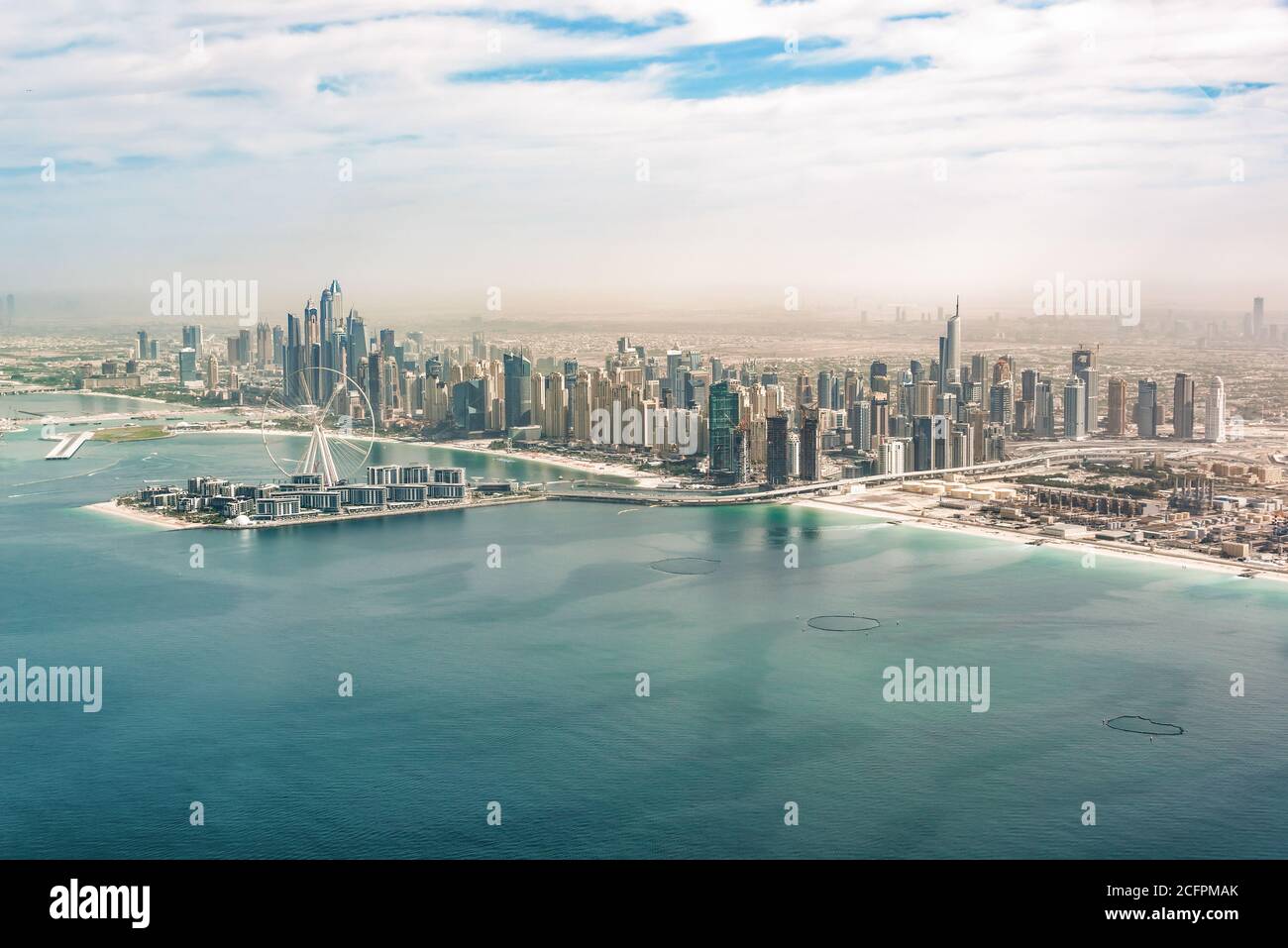 Aerial view of Dubai Marina skyline with Dubai Eye ferris wheel, United Arab Emirates Stock Photo