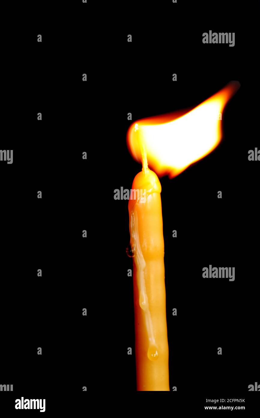 Lighting a candle in a Greek Orthodox church Stock Photo Alamy