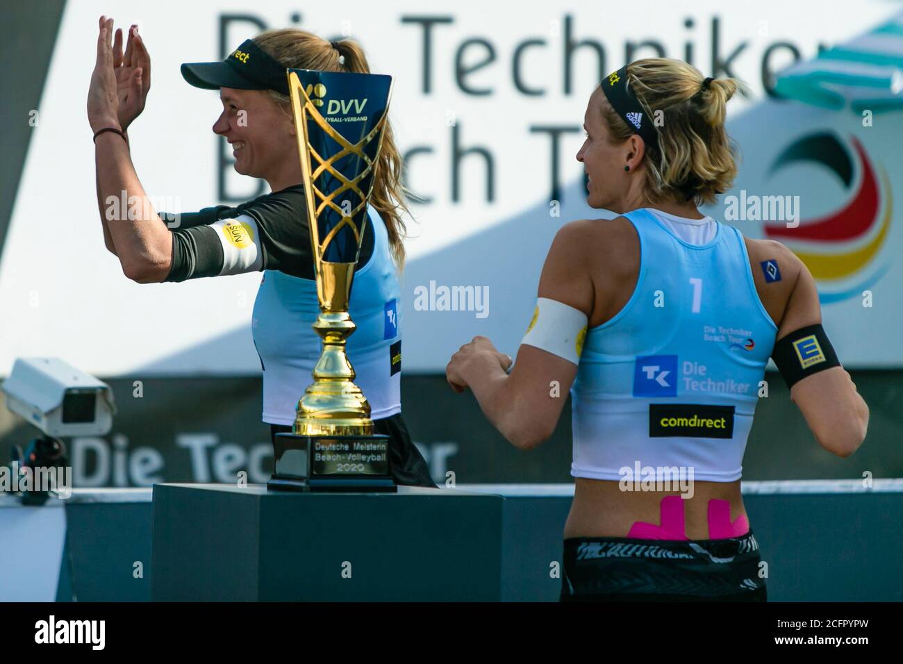 Timmendorfer Strand, Germany. 05th Sep, 2020. Laura Ludwig (r) and Margareta Kozuch (Hamburg) walk past the DM trophy at the German Beach Volleyball Championships during the award ceremony. Credit: Frank Molter/dpa/Alamy Live News Stock Photo