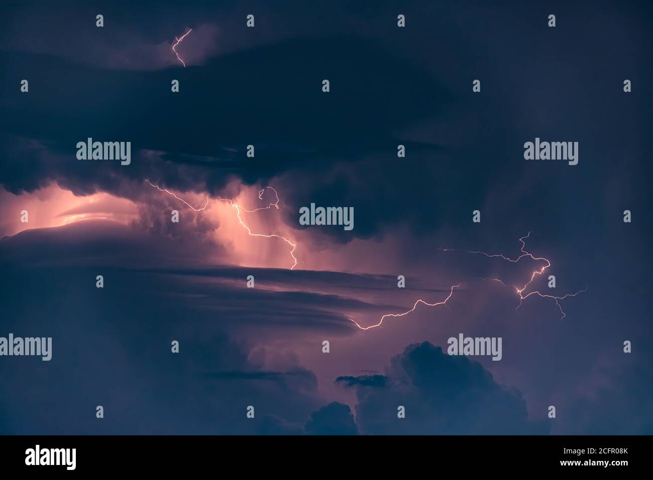 Lightning strike on the dark cloudy sky Stock Photo - Alamy