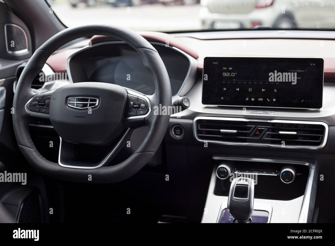 Russia, Izhevsk - August 14, 2020: Geely showroom. Steering wheel and interior of new modern CoolRay car. Car manufacturer from China. Stock Photo