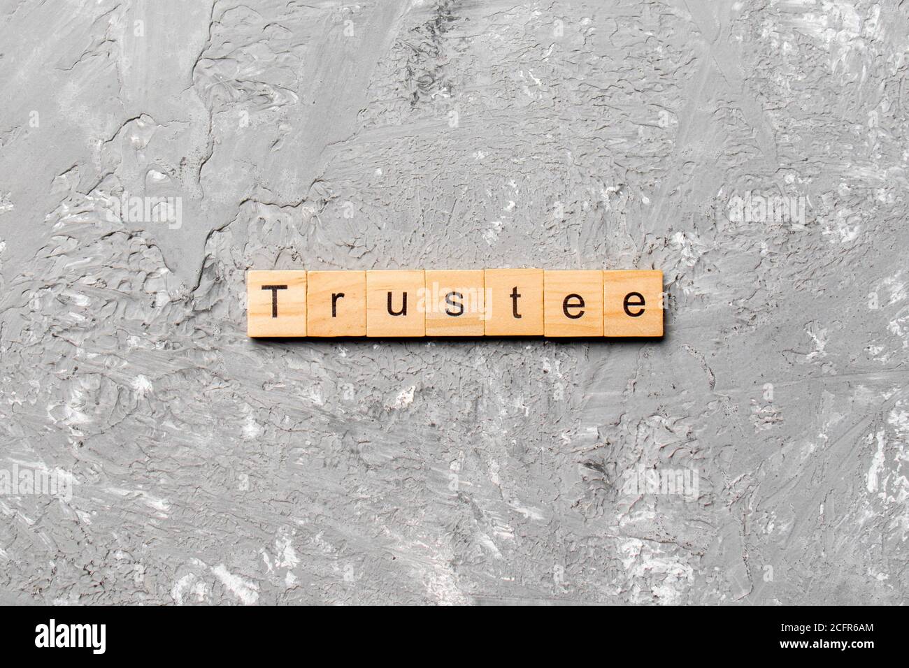 trustee word written on wood block. trustee text on table, concept. Stock Photo