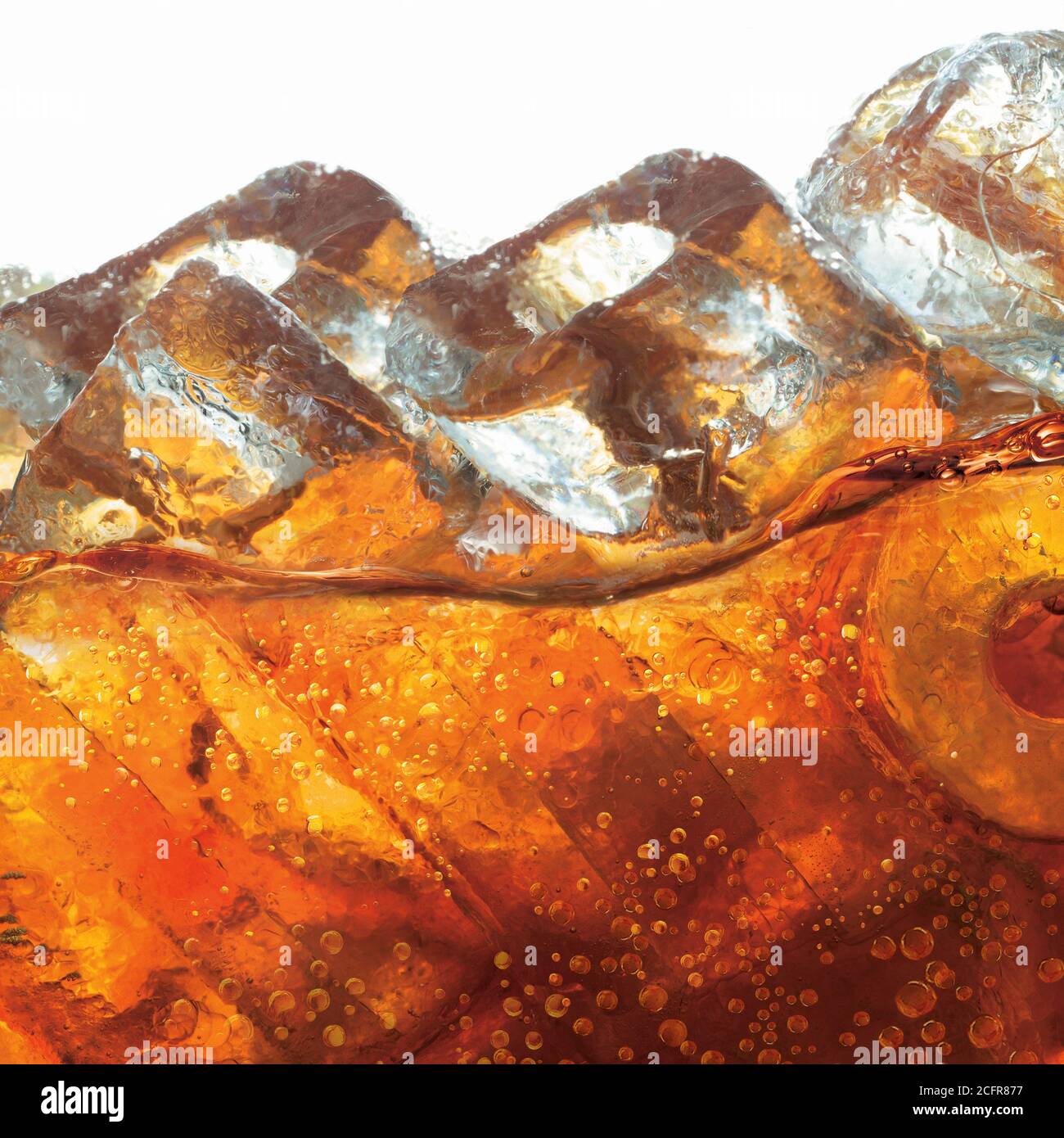 Cola beverage with ice cubes close up Stock Photo