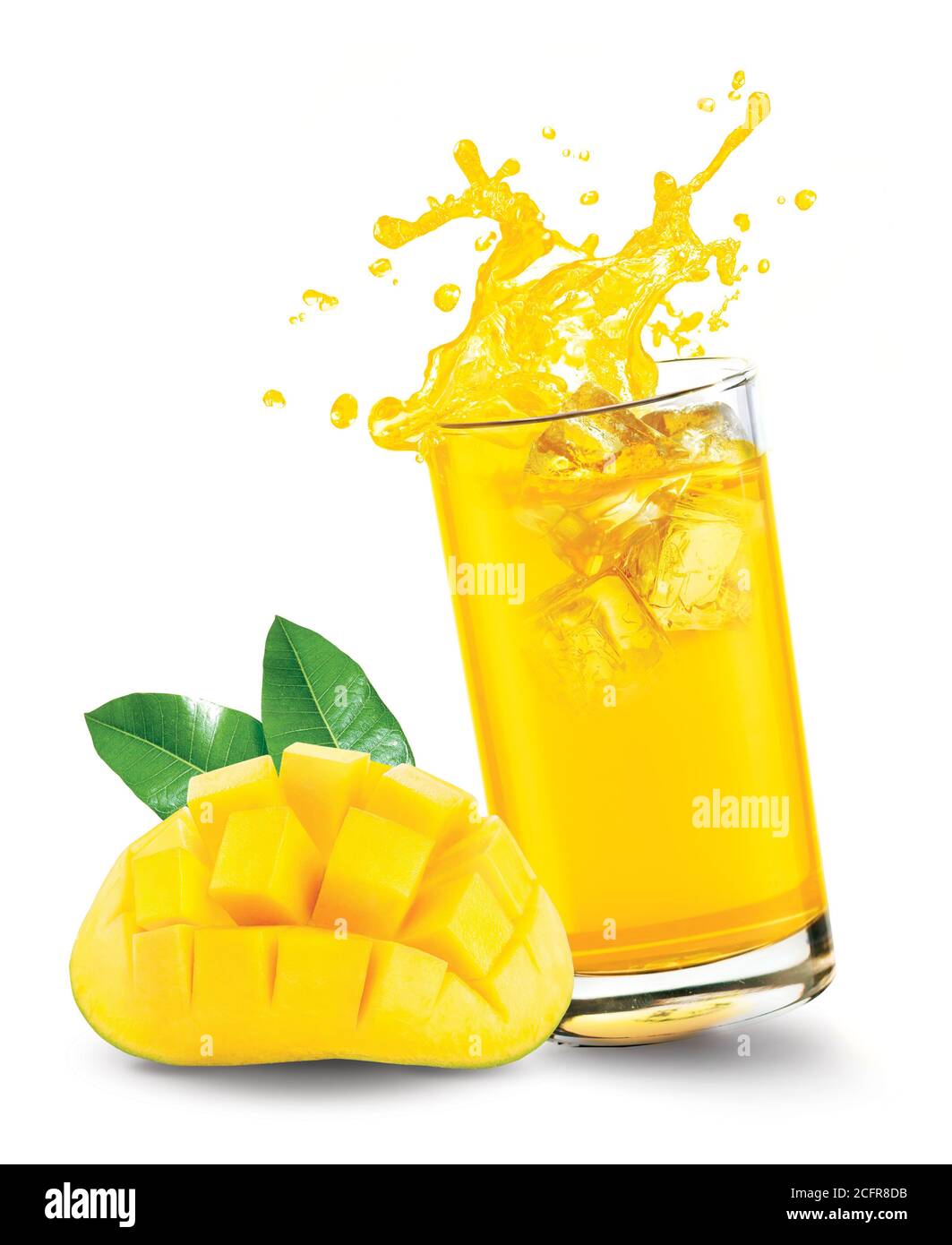 Glass of splashing mango juice with mango fruit on white background Stock Photo