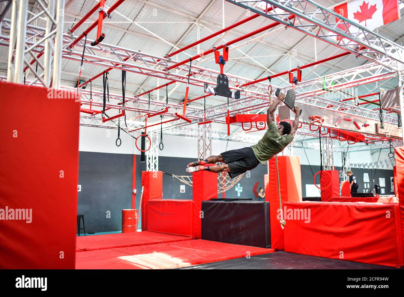 Villeurbanne (central-eastern France): Warrior Adventure Sports Complex. Participant doing an indoor obstacle course race inspired by the TV show 'Nin Stock Photo
