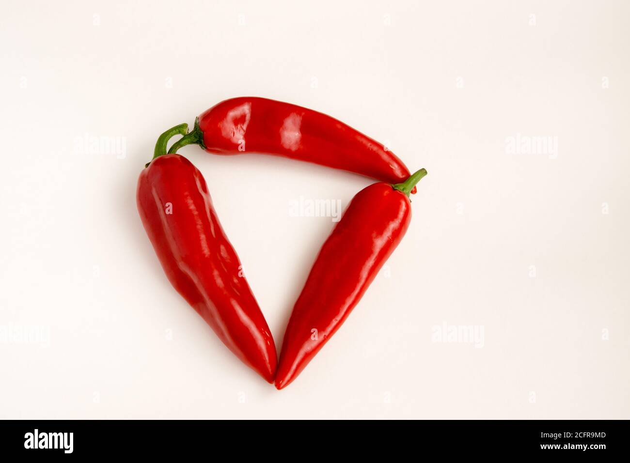 Paprika on a white background in different versions. Stock Photo