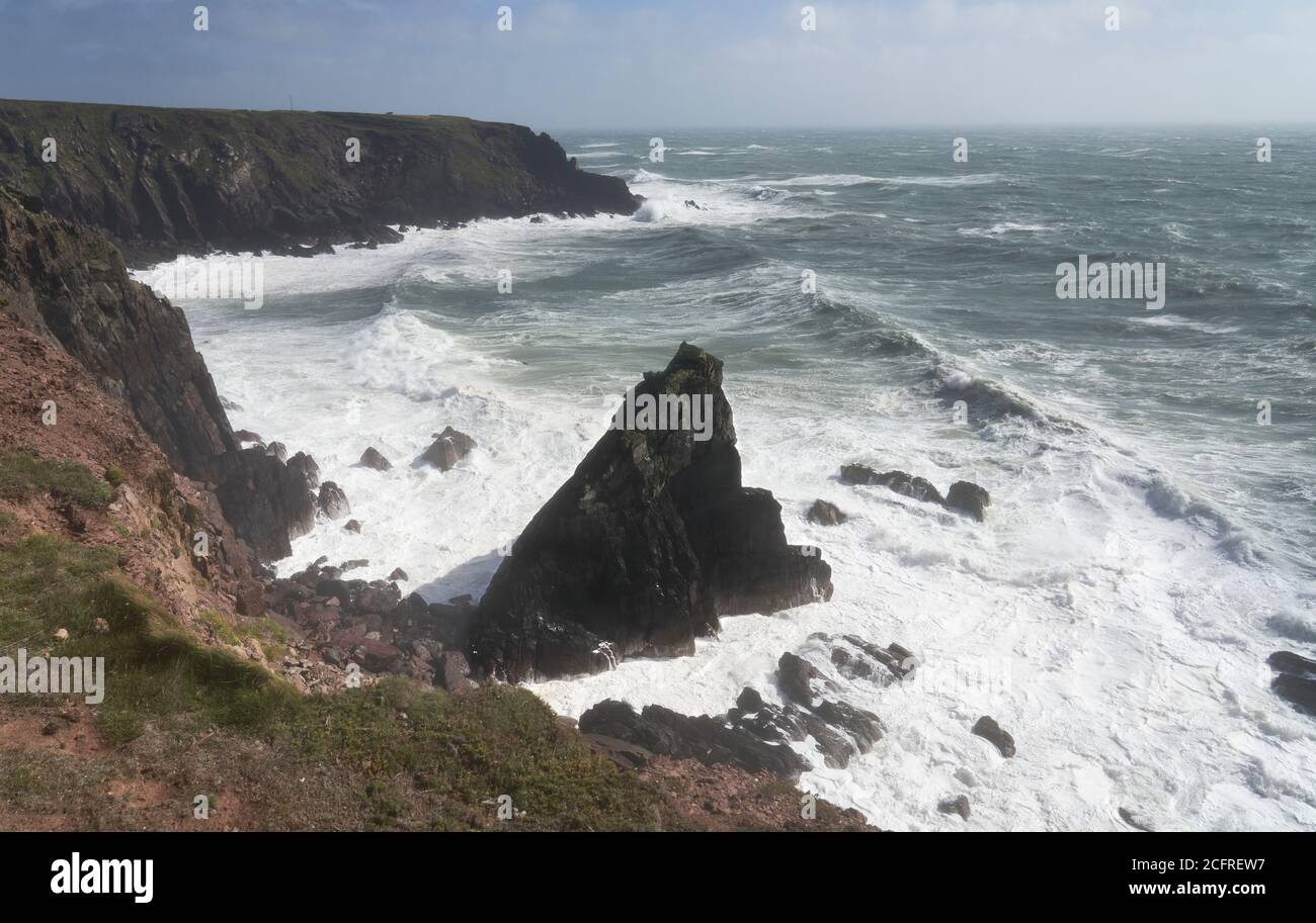 Storm pounding the cliffs near St. Ann's Head, entrance to Milford Haven, Pembrokeshire, Wales Stock Photo