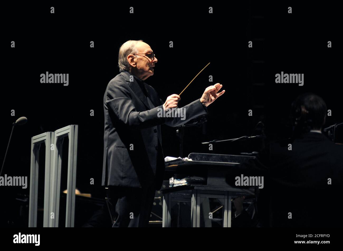 Milan Italy , 10/11/2012 : Live concerto of  Ennio Morricone at the Mediolanum Forum Stock Photo