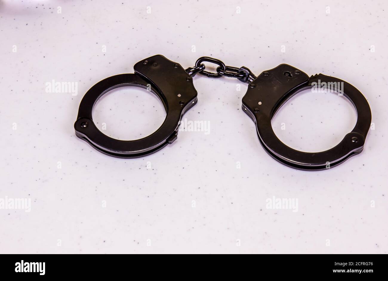 Black Police Handcuffs For Containment Stock Photo Alamy