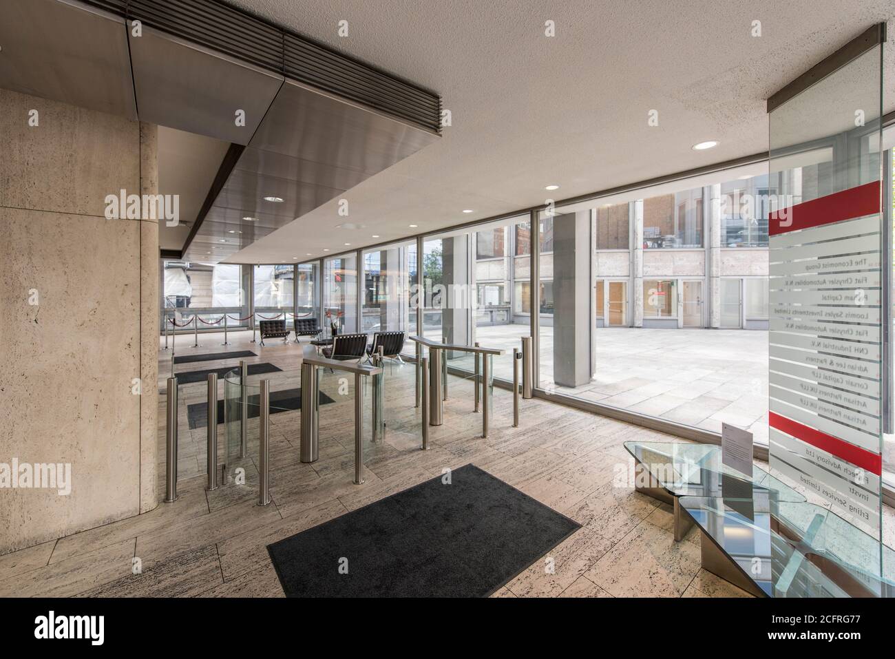 Reception area in the main tower prior to refurbishment. The Economist Building, London, United Kingdom. Architect: Alison & Peter Smithson, dsdha ref Stock Photo