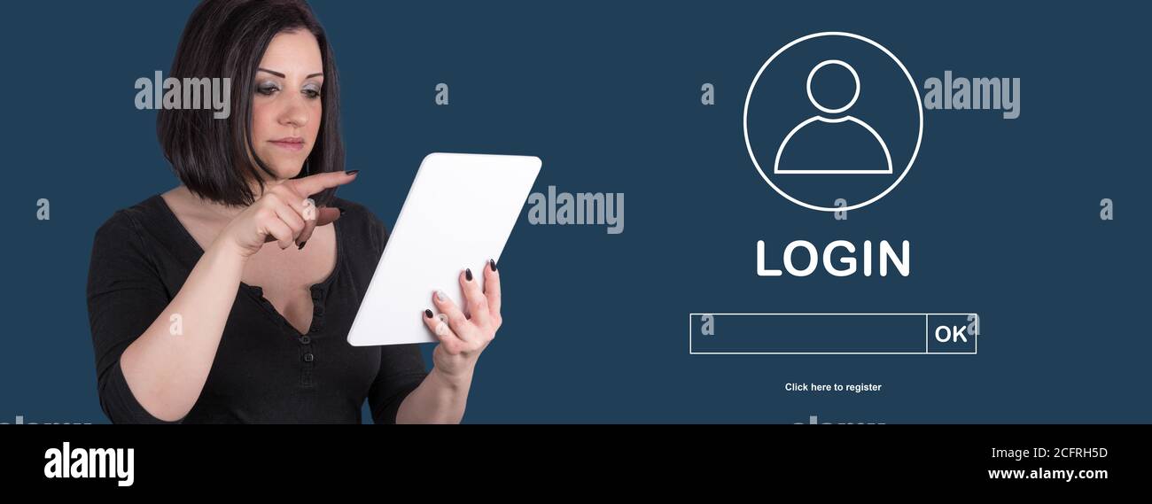 Woman using digital tablet with login concept on background Stock Photo