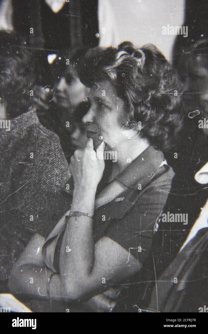 Fine 1970s vintage black and white photography of an older scout listening intently at a meeting. Stock Photo