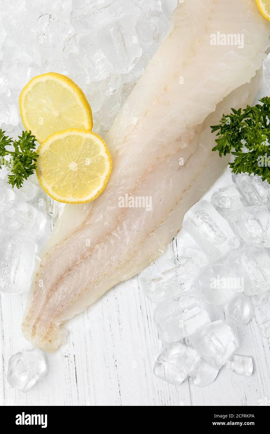 Raw white fish on ice Stock Photo
