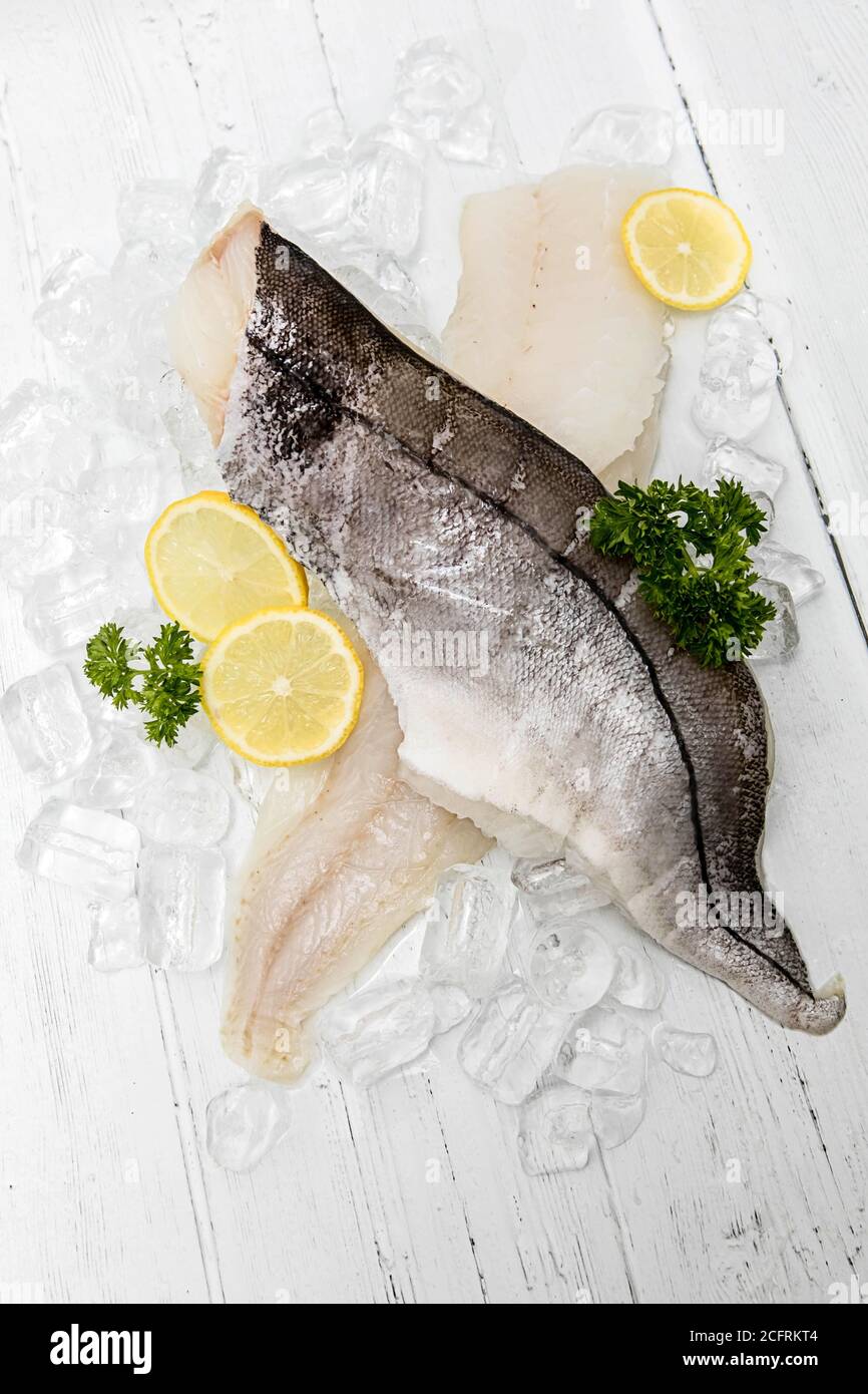 Raw white fish on ice Stock Photo