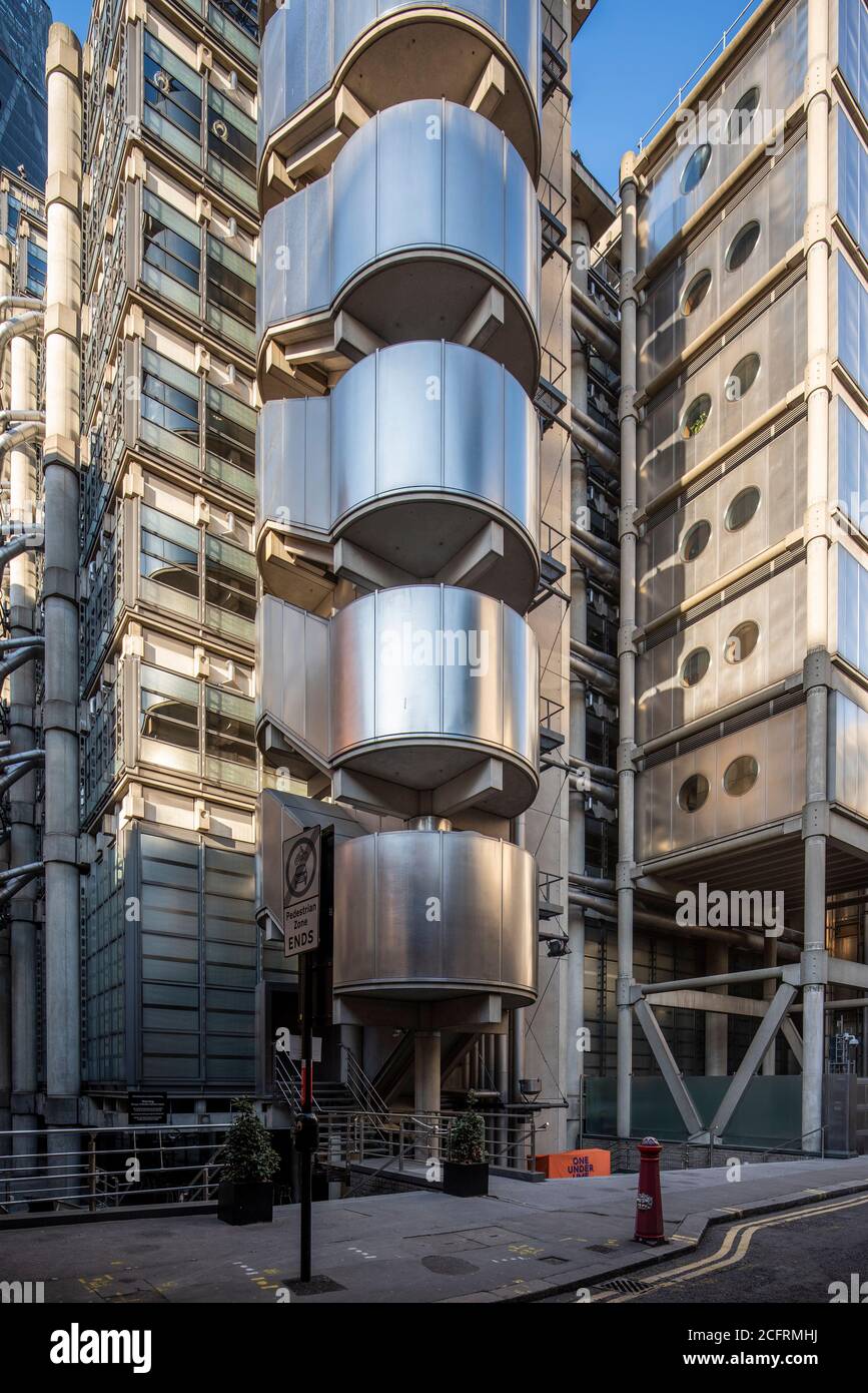 View from Leadenhall Market showing external stairwell and toilet pods.  Lloyd's Building, London, United Kingdom. Architect: Rogers Stirk Harbour +  P Stock Photo - Alamy