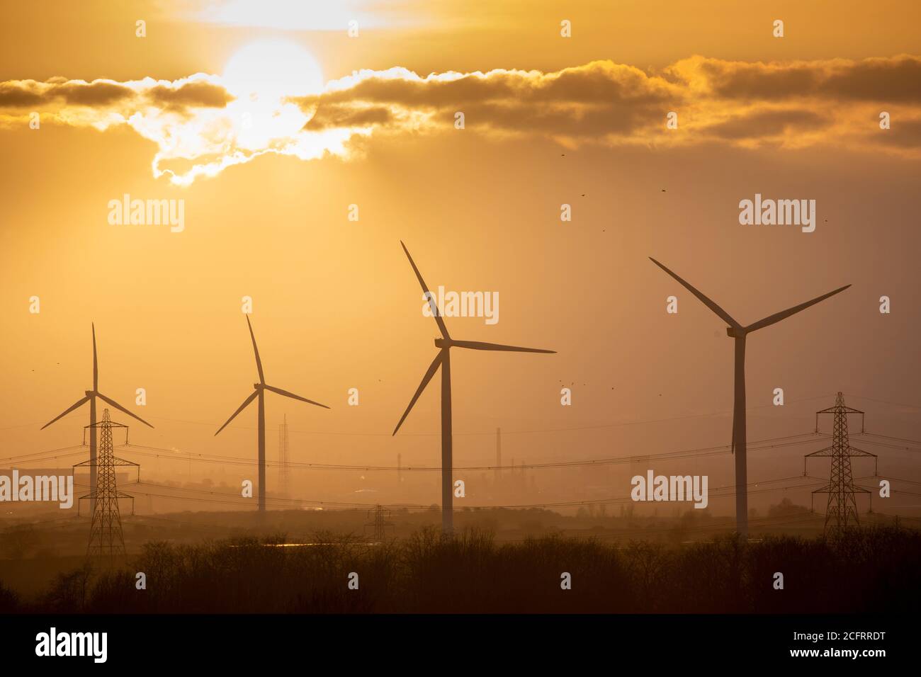 Wind Turbines at Sunset Stock Photo