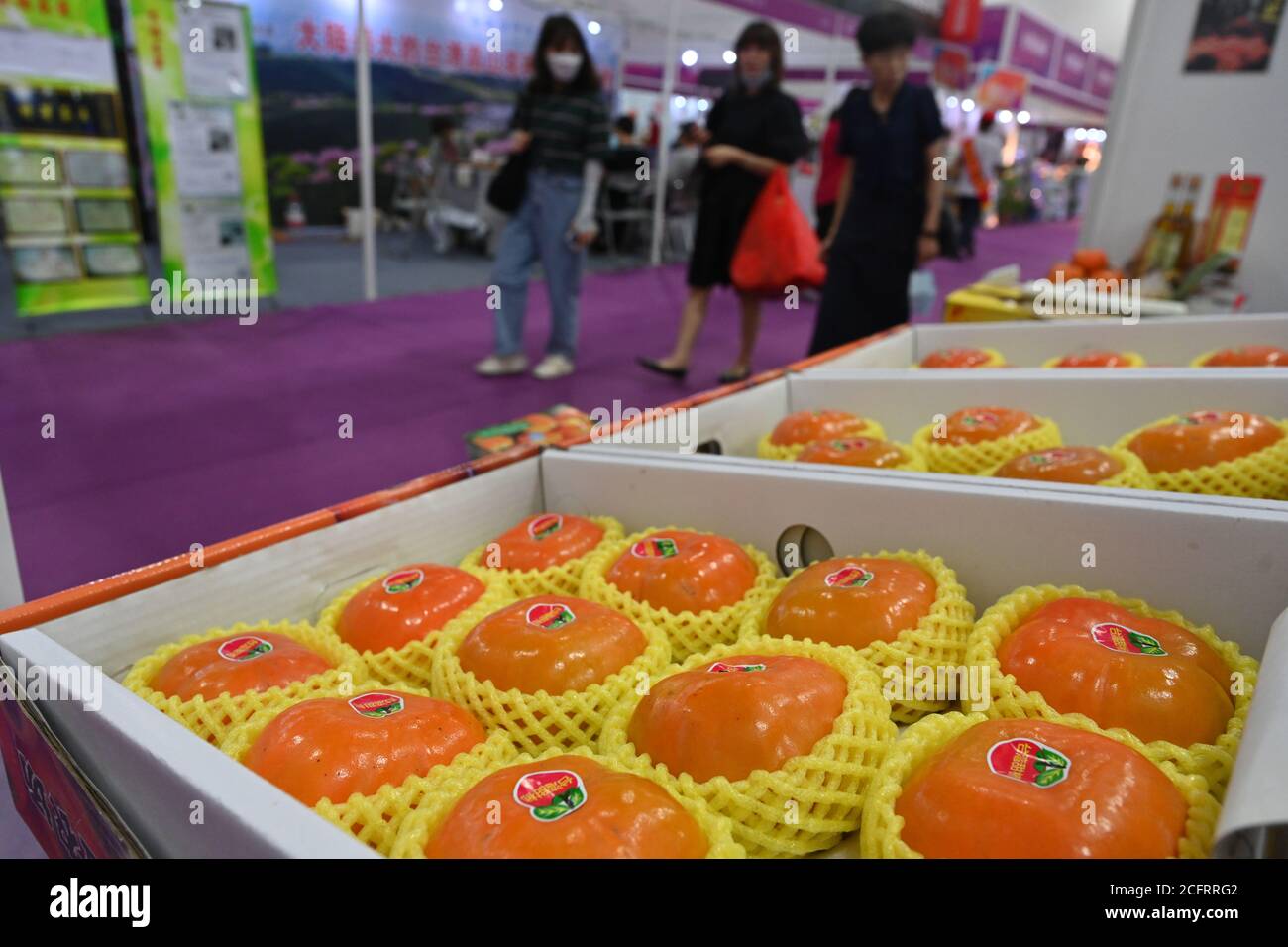 Nan'an, China's Fujian Province. 7th Sep, 2020. Photo shows persimmons exhibited at a booth from China's Taiwan at the 13th Cross-Strait Agricultural Products Fair (Quanzhou) held in Nan'an of Quanzhou, southeast China's Fujian Province, Sept. 7, 2020. The fair kicked off here on Monday. Credit: Song Weiwei/Xinhua/Alamy Live News Stock Photo